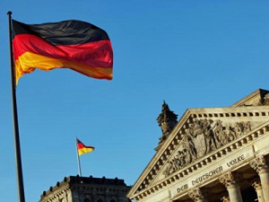 The German flag flys outside the Reichst