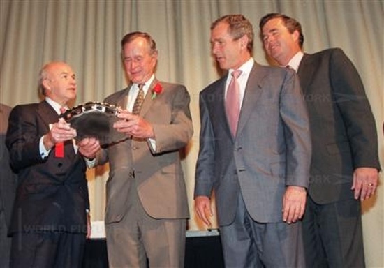 Ken Lay with George Bush Junior and Senior.